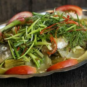 2 cách làm cá rô phi om dưa chua không tanh