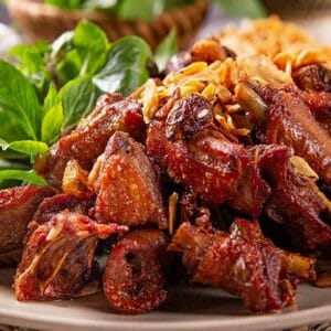 Cách làm món ngan cháy tỏi thơm ngon nức mũi